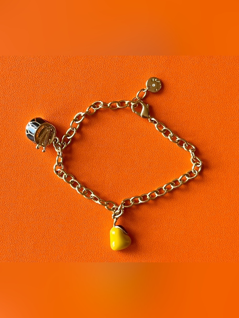 Talbots Charm Bracelet with holiday drum & yellow pear .
